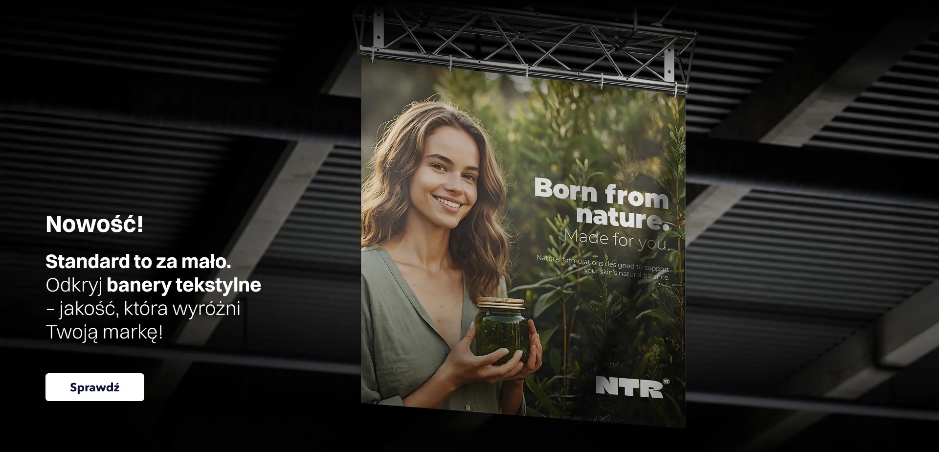 Baner promocyjny na stronę przedstawiający nowe banery tekstylne z hasłem „Nowość! Odkryj banery tekstylne – jakość, która wyróżni Twoją markę